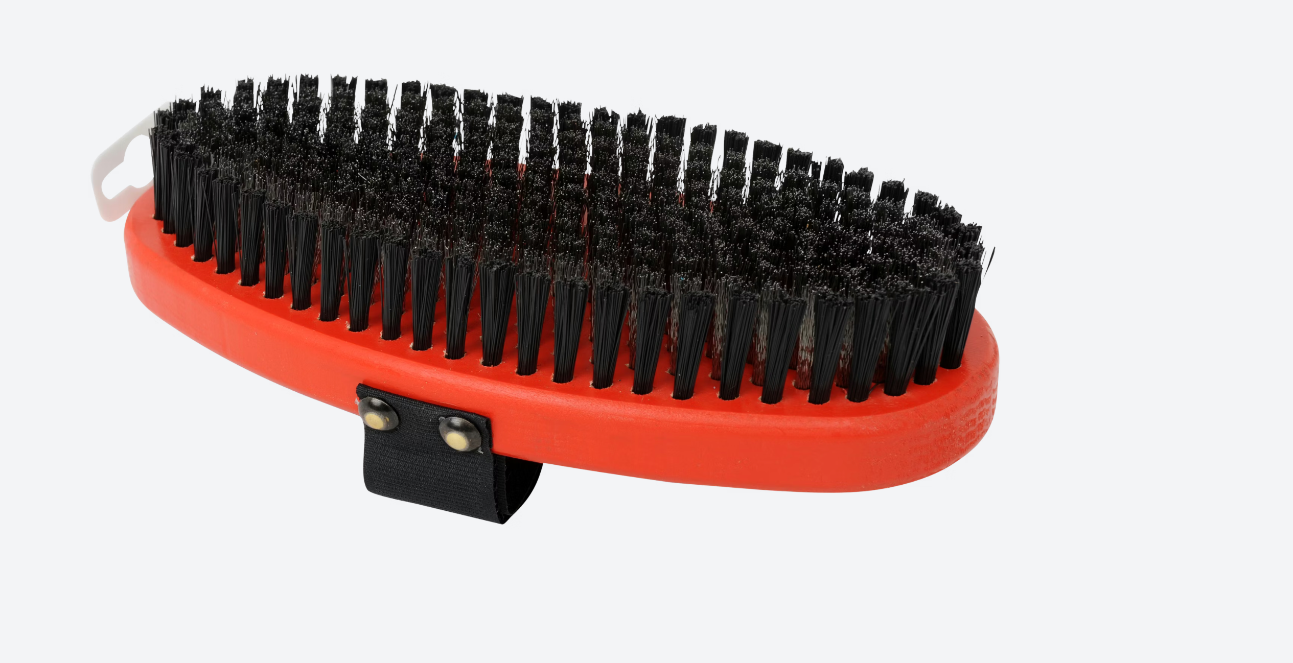 Swix brush for ski waxing, featuring a sturdy handle and bristles for effective application and grooming of ski bases.